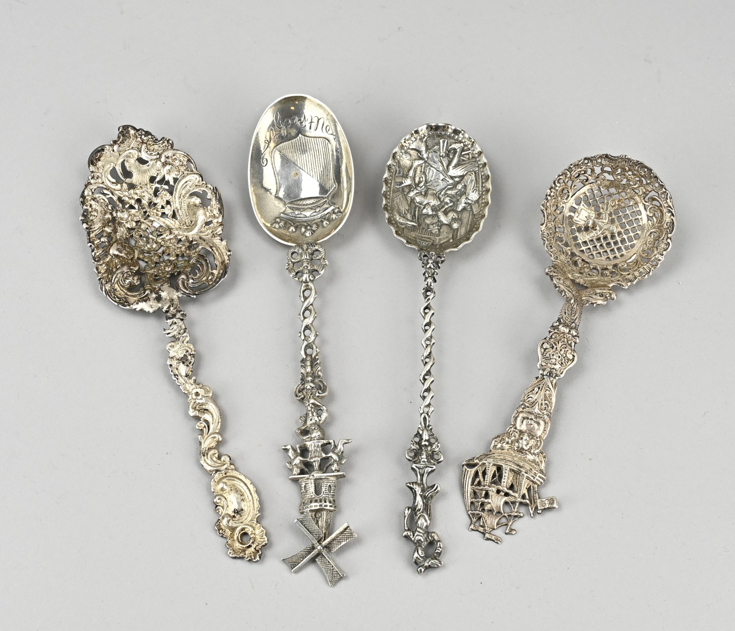 4 Silver decorative spoons