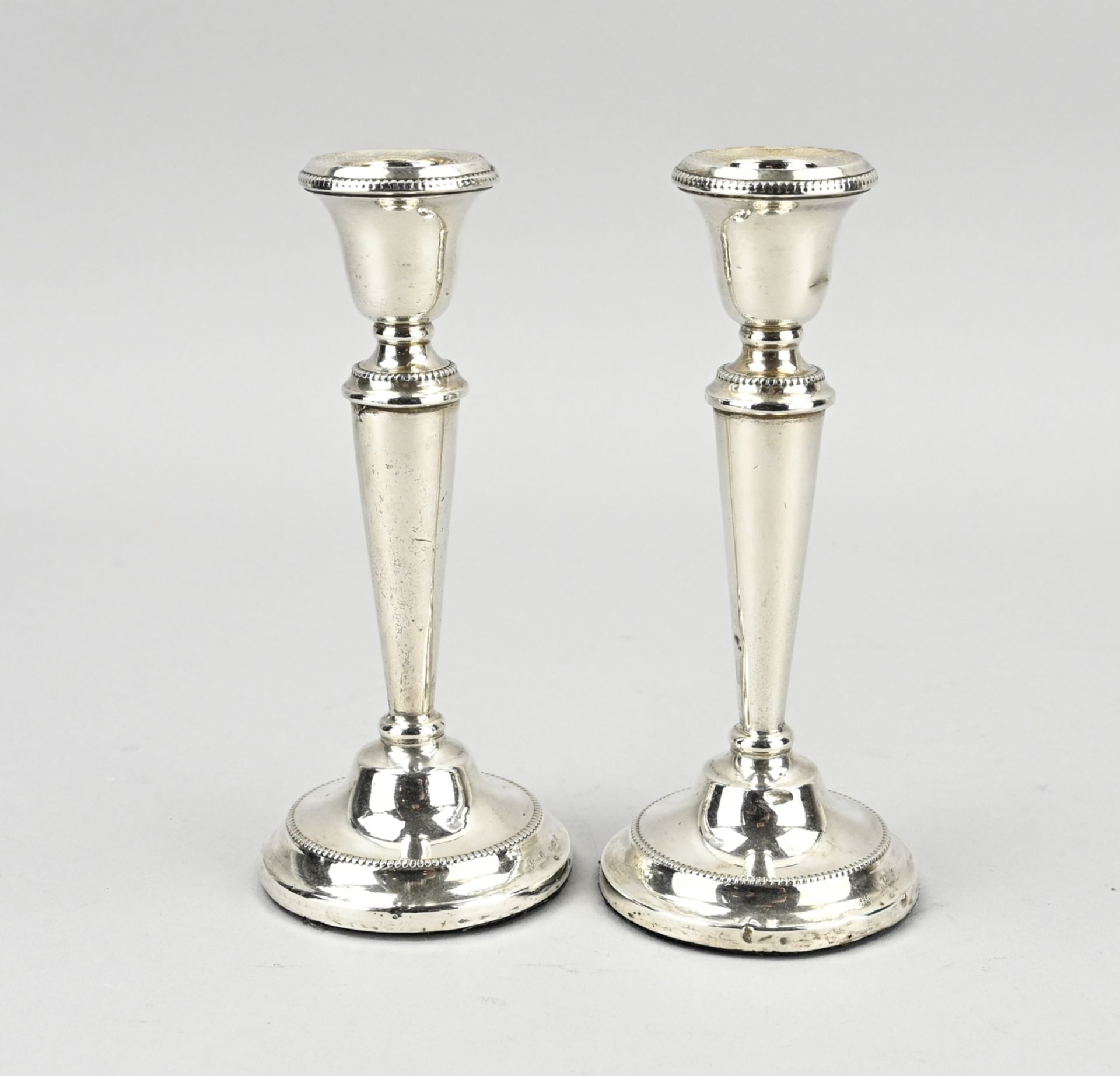 Pair of silver candlesticks