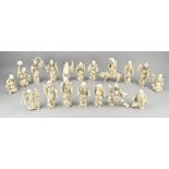 Lot with 18 carved statues (bone)