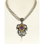 Silver jasseron necklace with amethyst pendant