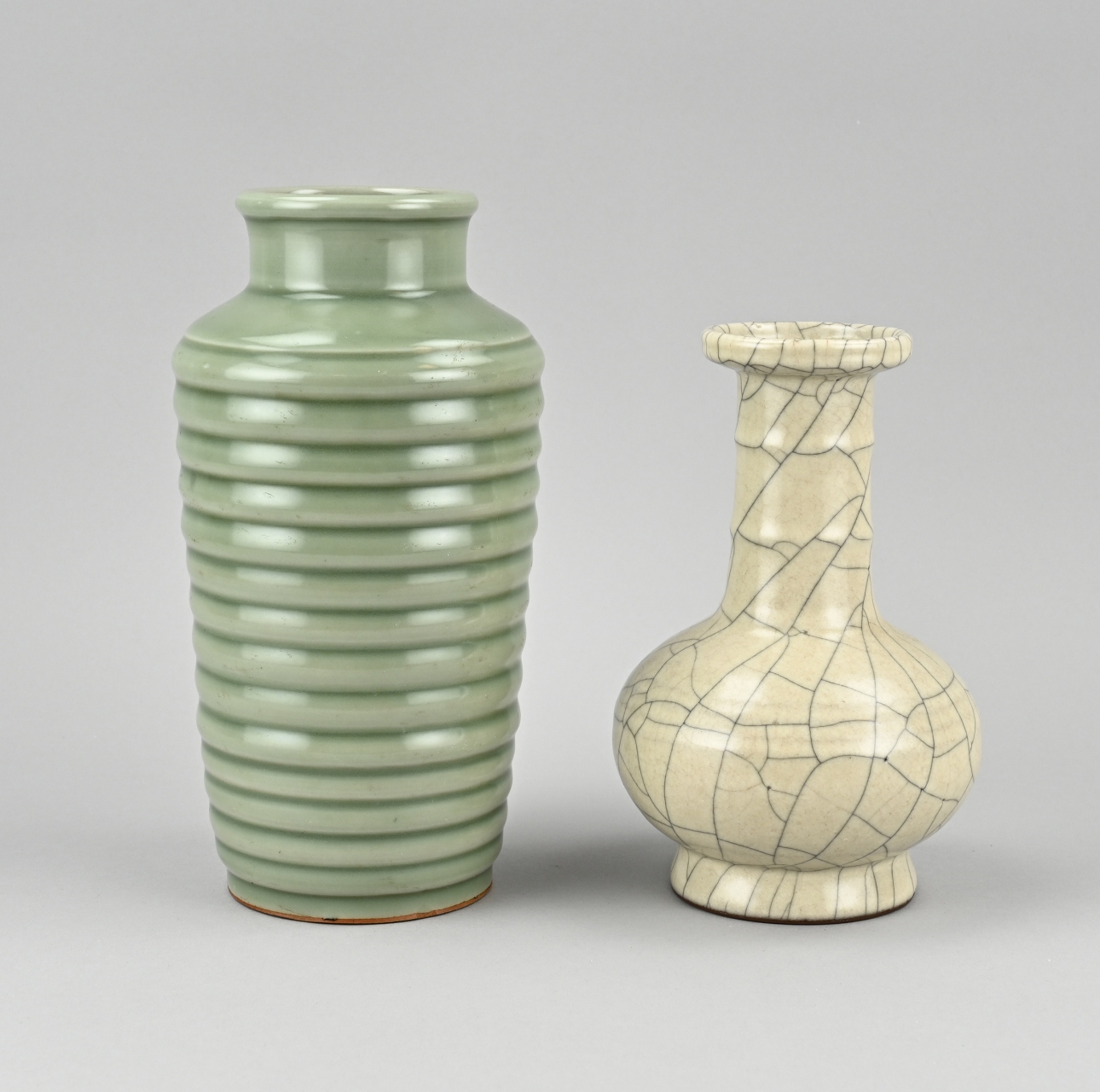 2x Celadon vase, H 18.5 - 23.5 cm.