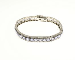 Silver bracelet with stones