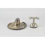 Silver telephone and sombrero