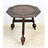 Folding table with carving