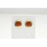 Gold stud earrings with red coral