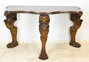 Console table with lion heads