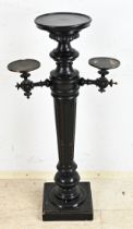 Ebonized flower table, H 112 cm.