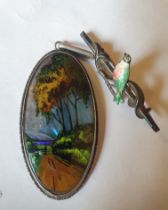 A Small Silver and Enamel Bird Brooch,together with a morpho butterfly wing picture silver pendant