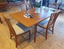 A H McIntosh Teak Extending Dining Table with Four Matching Dining Chairs. Extended size is 66 inch