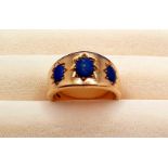 9ct Thick Yellow Gold Ring set with three blue stones, weight 6.96g, size K, Hallmarked London 1976