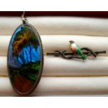 A Small Silver and Enamel Bird Brooch,together with a morpho butterfly wing picture within a silver