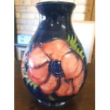 Moorcroft Deep Blue Anenome Vase measuring 8 inches in height