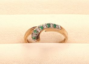 9ct Gold Ring set with 5 small emeralds, weight 1.6g, Size L