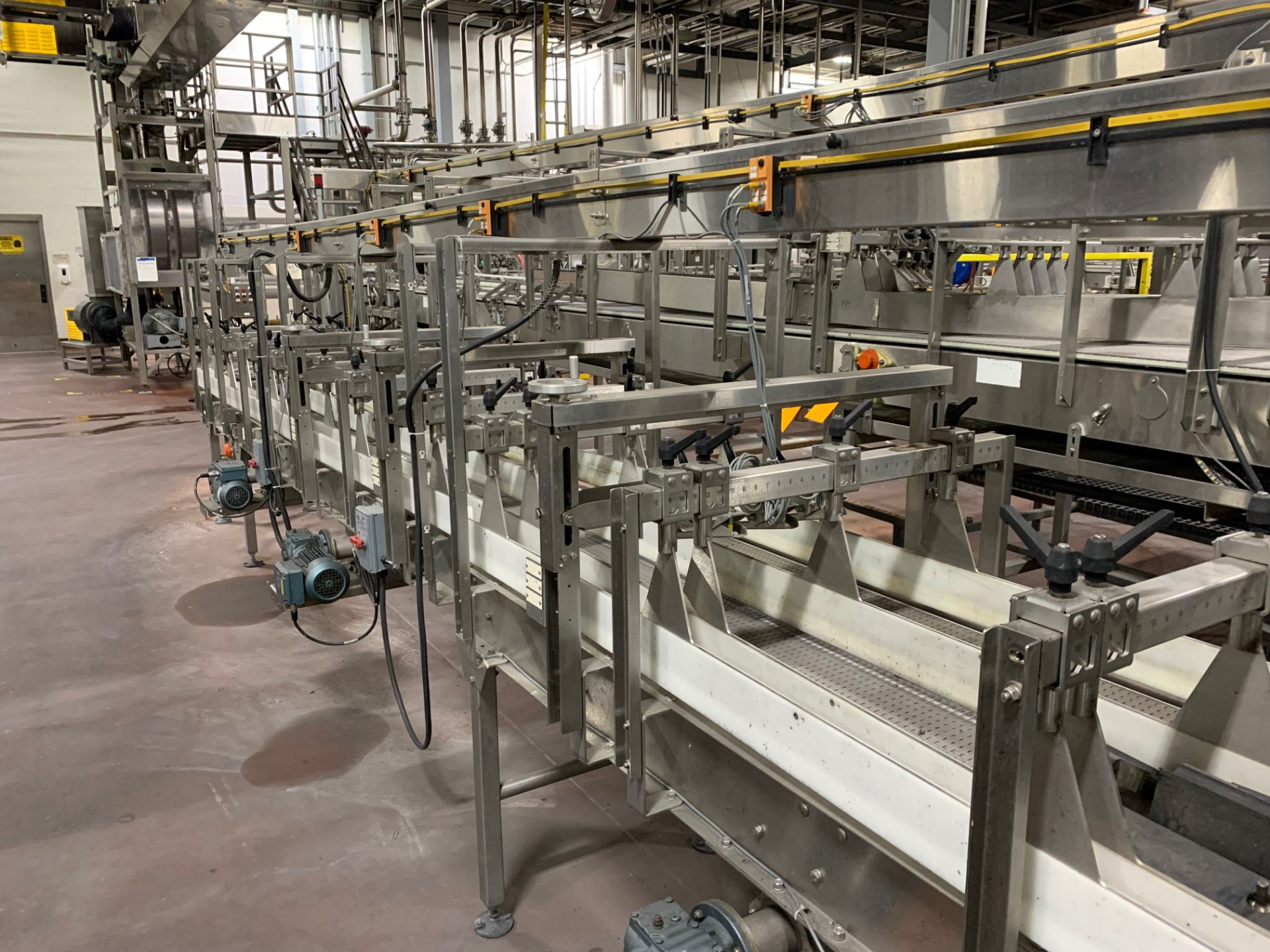 Sentry Carton Conveyor from Divider Switch to Krones Traypacker