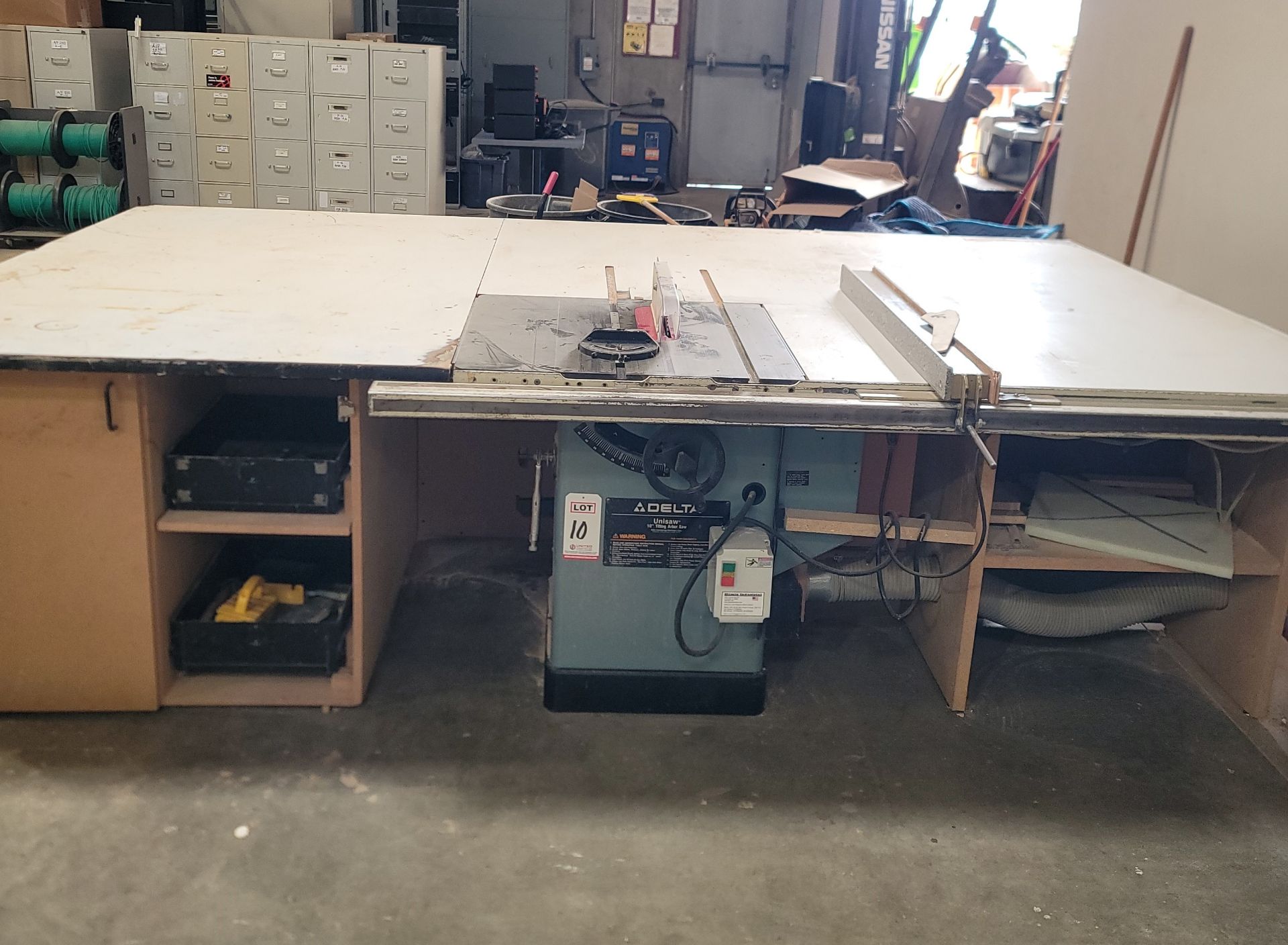 DELTA 10" UNISAW TABLE SAW, CAT. NO. 36-815, 3 HP, 230V, 28" X 27" CAST TABLE, 40-1/2" FENCE, S/N