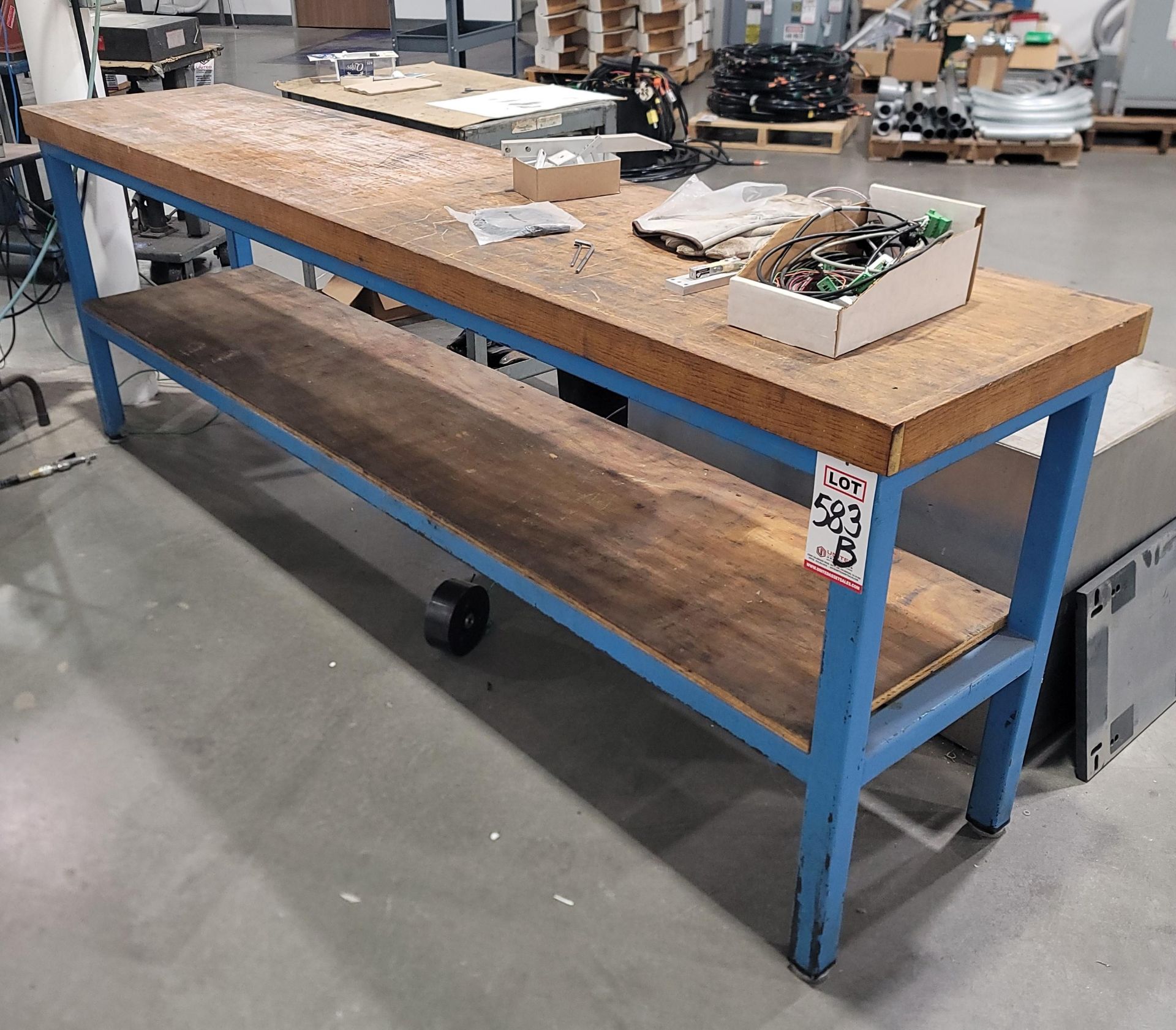 STEEL TABLE W/ 8' X 21" WOOD TOP, CONTENTS NOT INCLUDED