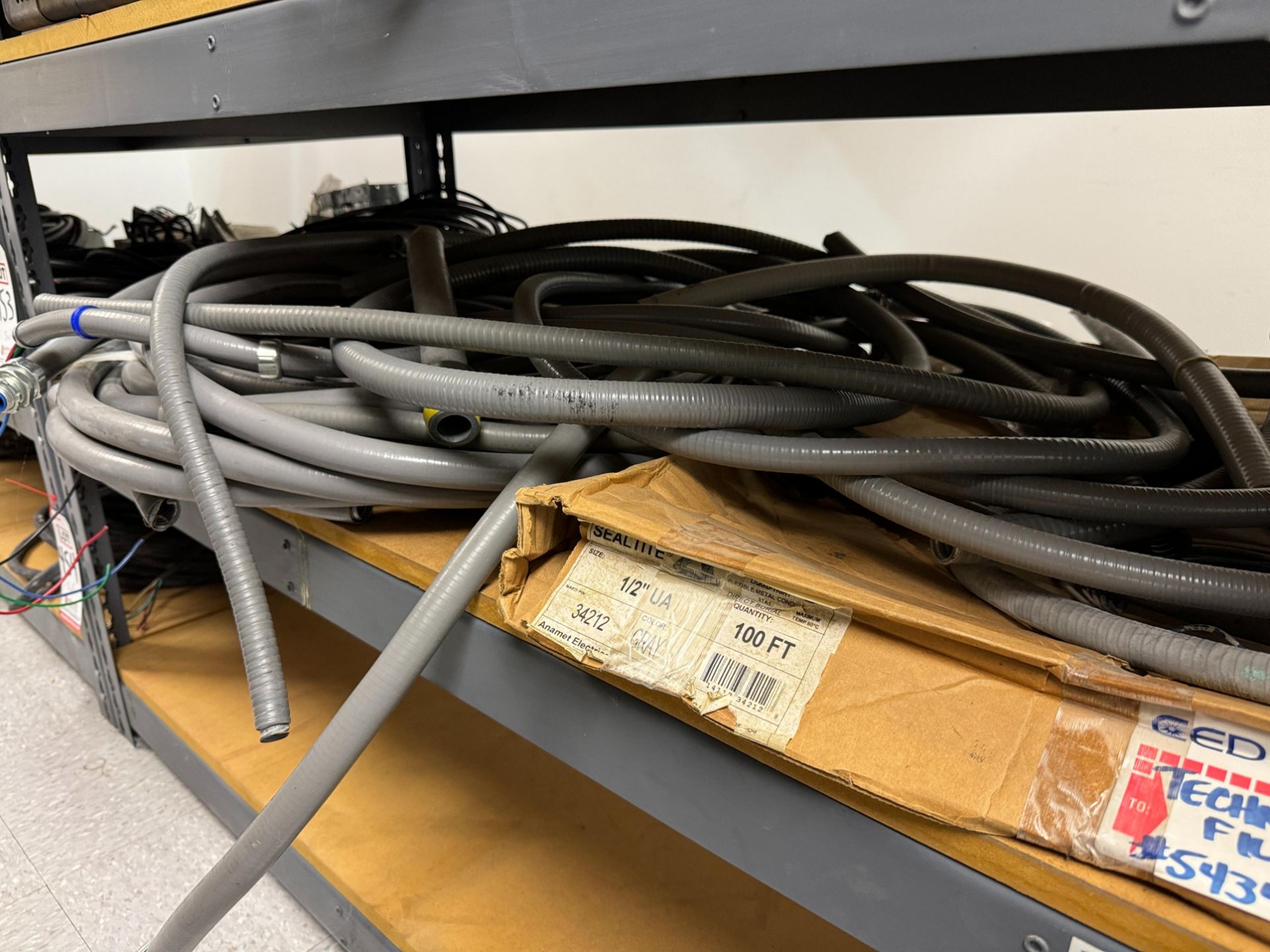 LOT - CONTENTS ONLY OF (1) SHELF, TO INCLUDE: FLEXIBLE CONDUIT, 24" TUBE LIGHT FIXTURE, WIRE - Image 2 of 3