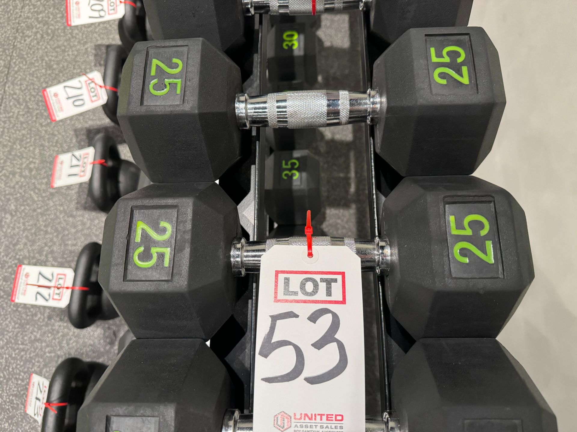 LOT - (2) 25 LB DUMBBELLS, (NOTE: SOLD SUBJECT TO BULK BID FOR ENTIRE FACILITY - SEE LOT 382)