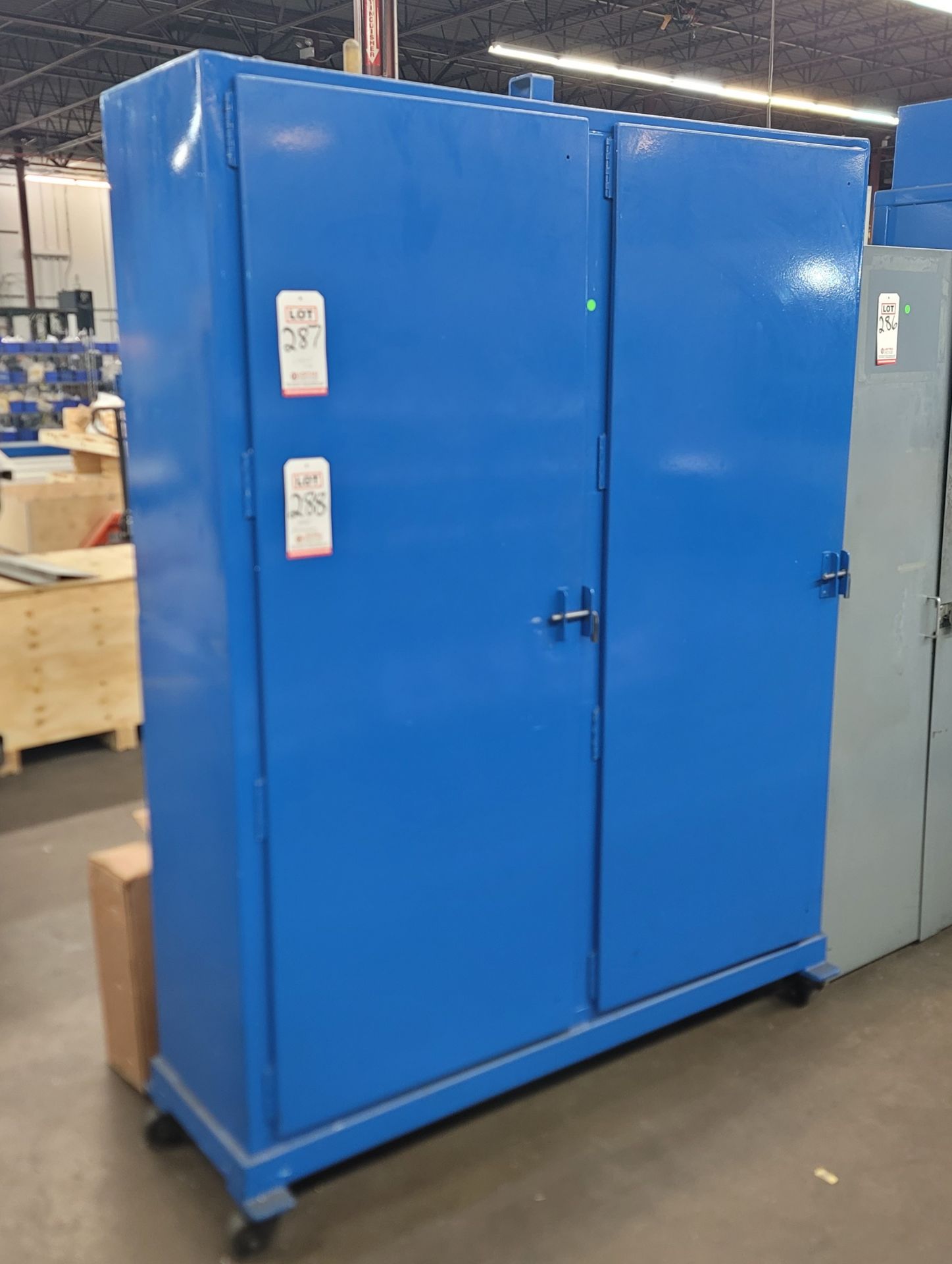 HEAVY DUTY 2-DOOR CABINET ON CASTERS, 61" X 16" X 80" HT, CONTENTS NOT INCLUDED