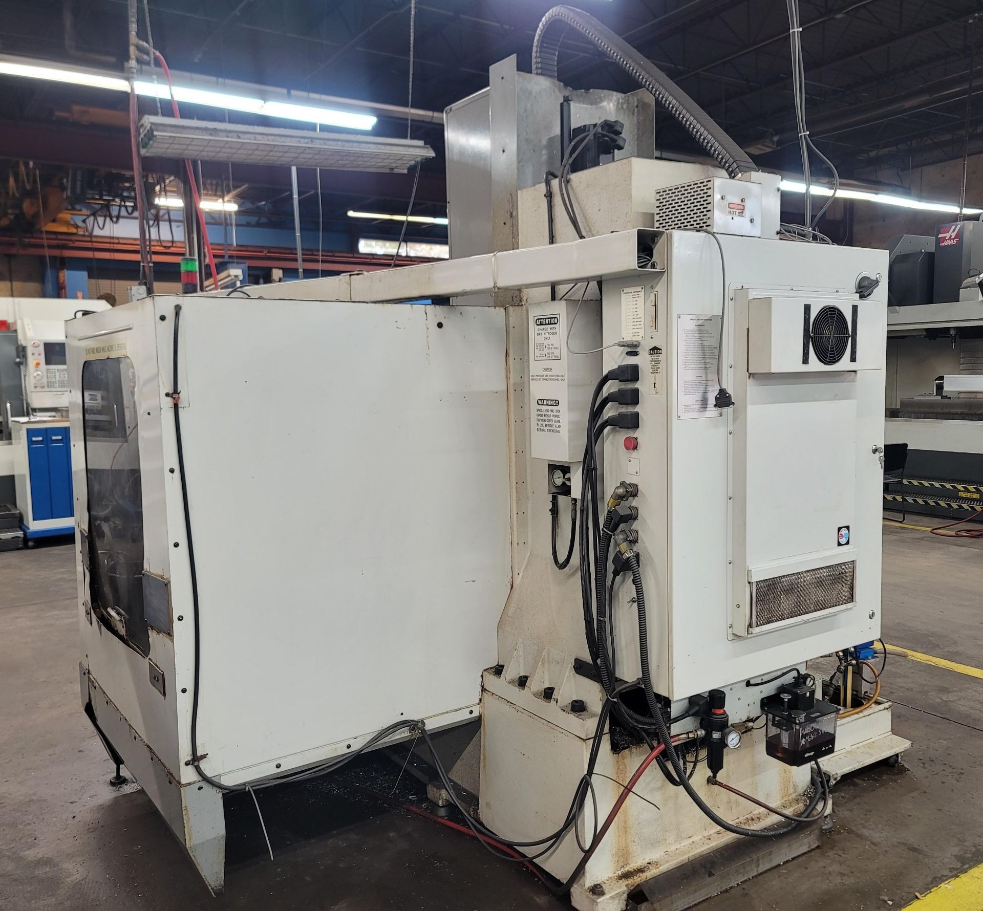 1996 HAAS VF-4 VERTICAL MACHINING CENTER, XYZ TRAVELS: 50" X 20" X 25", TABLE 52" X 18", 7500 RPM, - Image 3 of 12