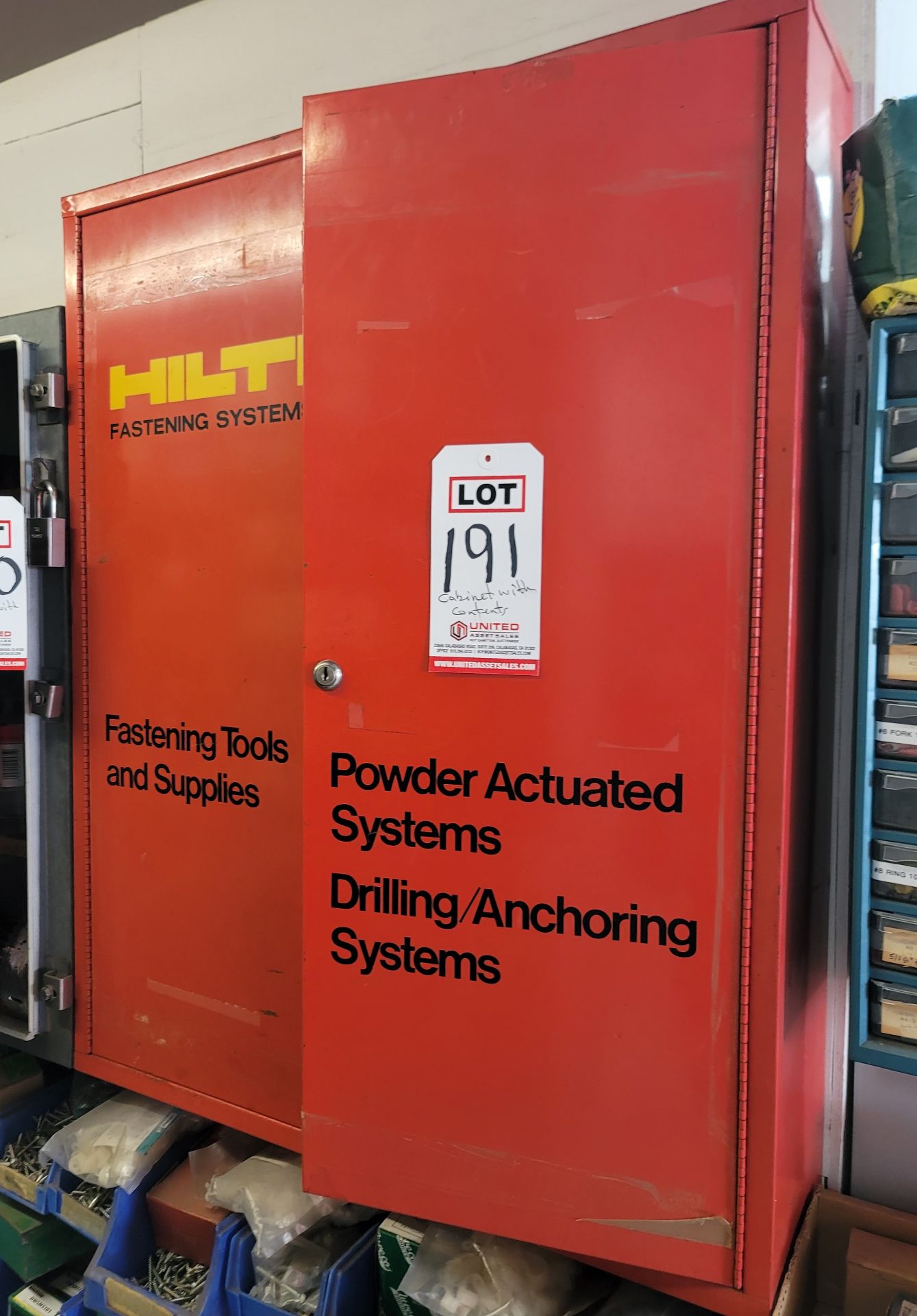 LOT - HILTI WALL CABINET, 27"W X 6"D X 34"HT, W/ CONTENTS: DRILL BITS, ROPER WHITNEY PUNCH SET,