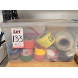 LOT - CLEAR TOTE CONTAINING MULTIPLE ROLLS OF VARIOUS TAPES, CAUTION TAPE, REFLECTIVE TAPE, ETC.