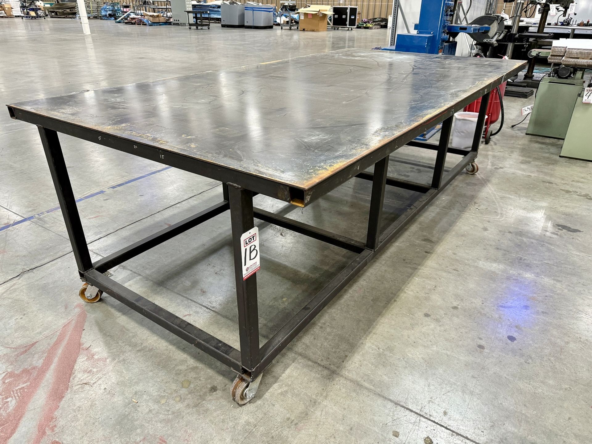 PORTABLE STEEL TABLE, 5' X 10', METAL CASTERS