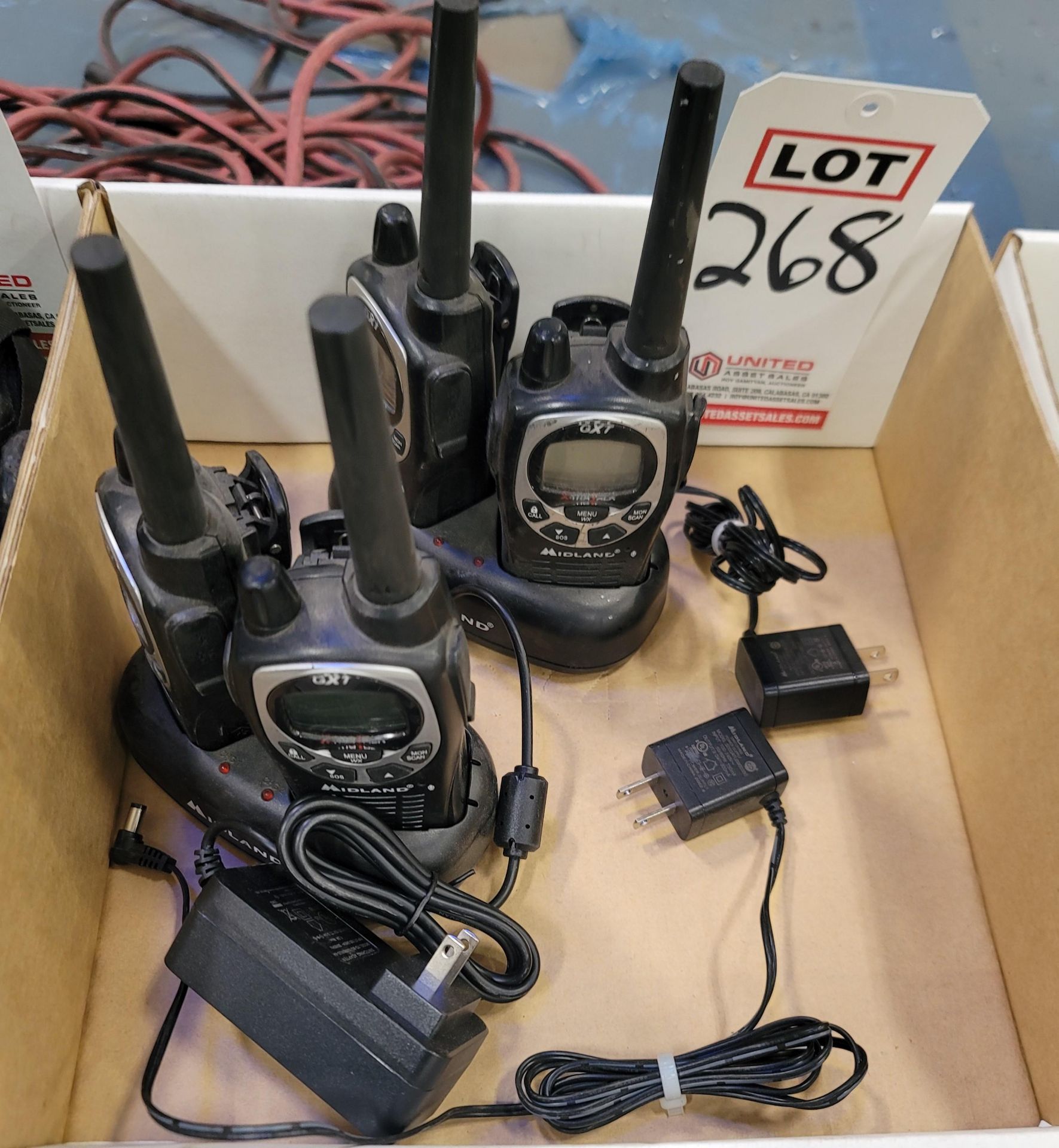 LOT - (4) MIDLAND X-TRA TALK TWO WAY RADIOS, MODEL GXT1000G, W/ CHARGING BASES