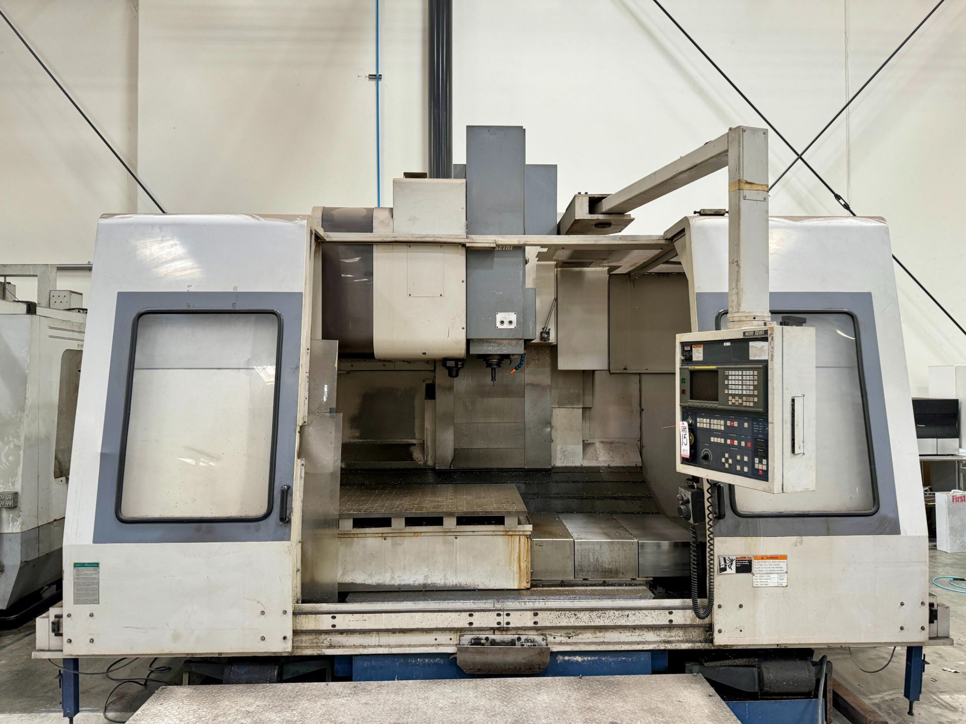 1997 MORI SEIKI MV-65/50 VERTICAL MACHINING CENTER, FANUC MF-M6 CNC CONTROL, TRAVELS: 60" X 25" X - Image 3 of 19