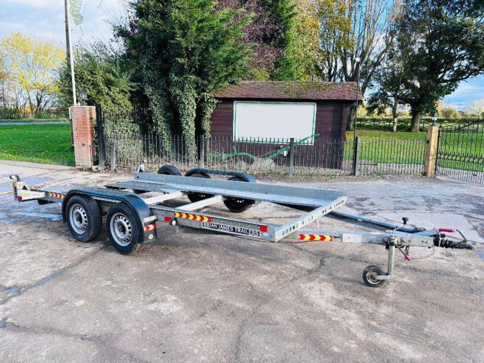 BRIAN JAMES TWIN-AXLE CAR TRANSPORTER TRAILER C/W LOADING RAMPS. - Image 11 of 11