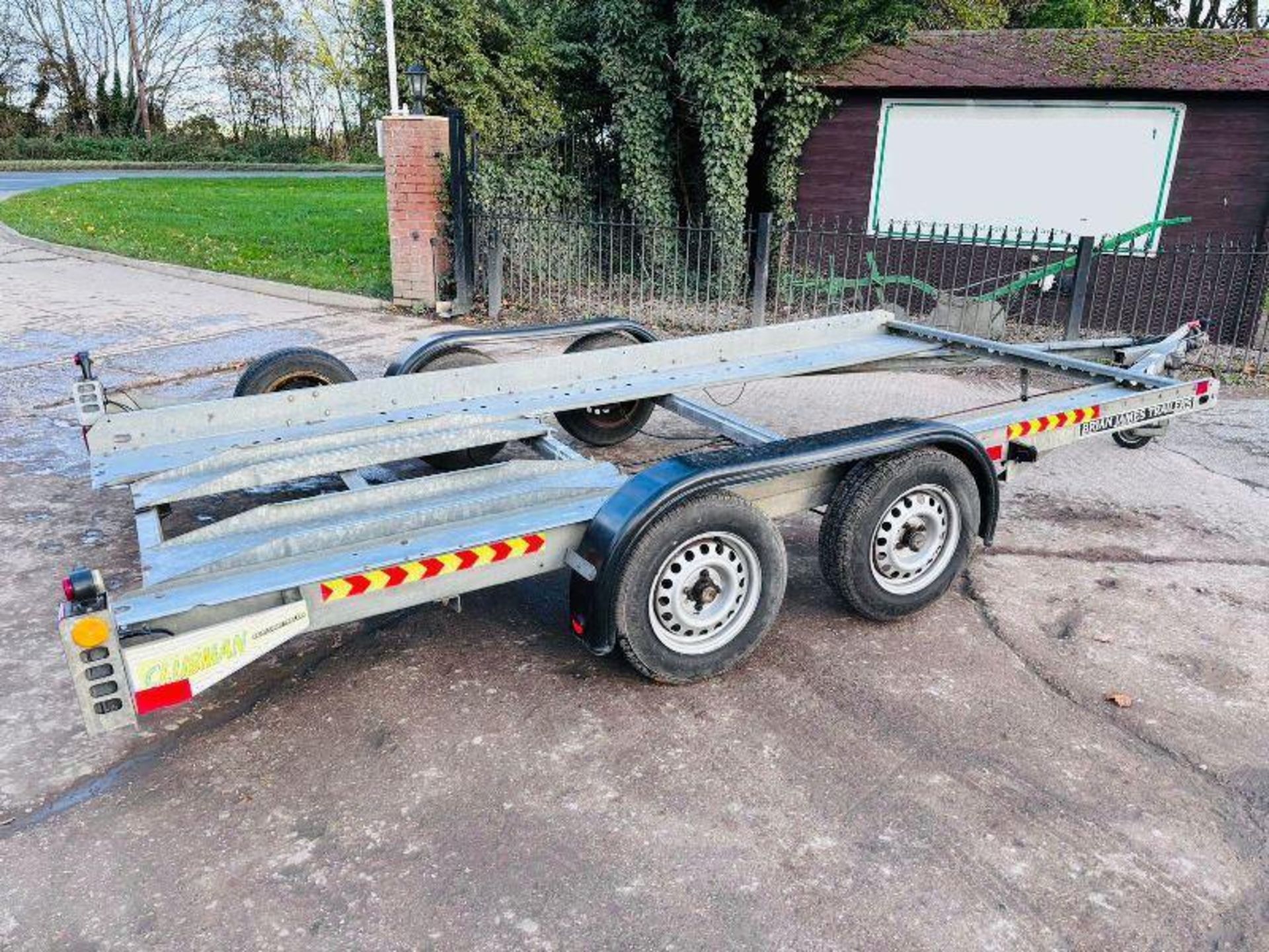BRIAN JAMES TWIN-AXLE CAR TRANSPORTER TRAILER C/W LOADING RAMPS. - Image 10 of 11