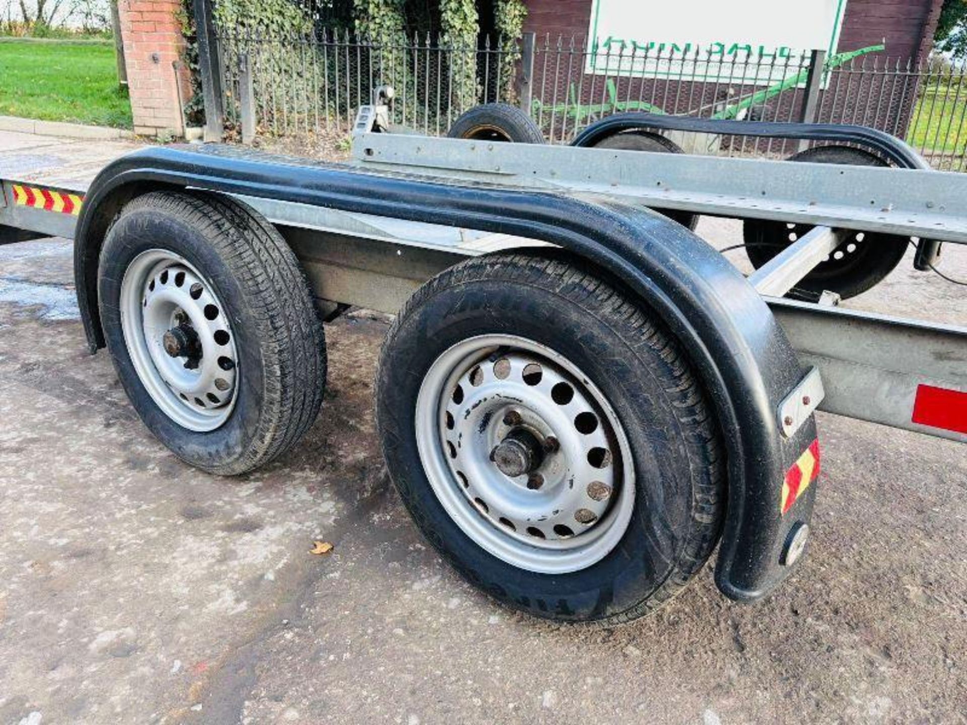 BRIAN JAMES TWIN-AXLE CAR TRANSPORTER TRAILER C/W LOADING RAMPS. - Image 9 of 11