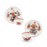 Meissen: TWO PORCELAIN TEA BOWLS WITH SAUCERS AND DECORATED-OVER TABLE PATTERN