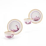 TWO PORCELAIN TEA BOWLS AND SAUCER WITH PURPLE MERCHANT SCENES