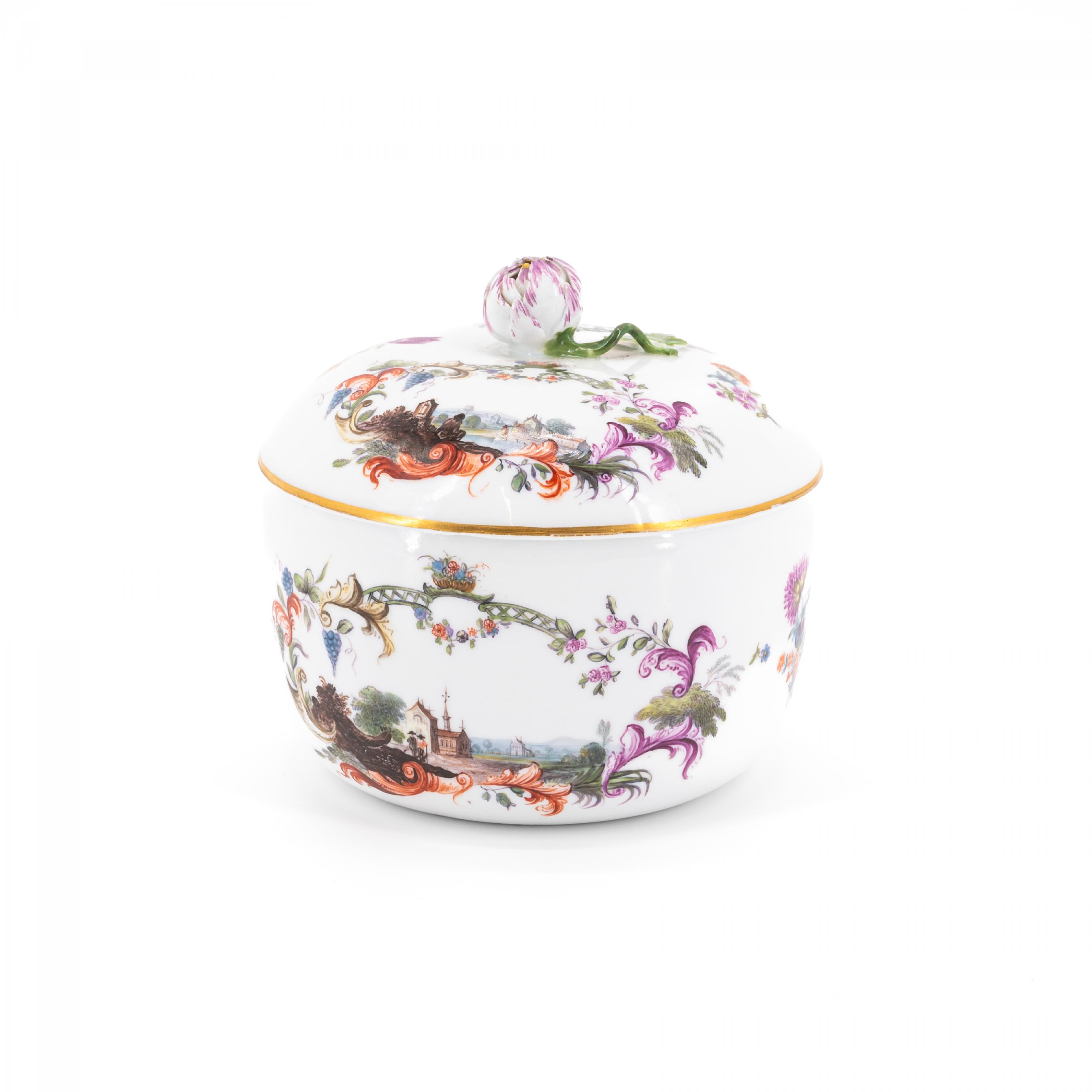 PORCELAIN SUGAR BOWL WITH LID WITH LANDSCAPE CARTOUCHES AND FLOWER FINIAL