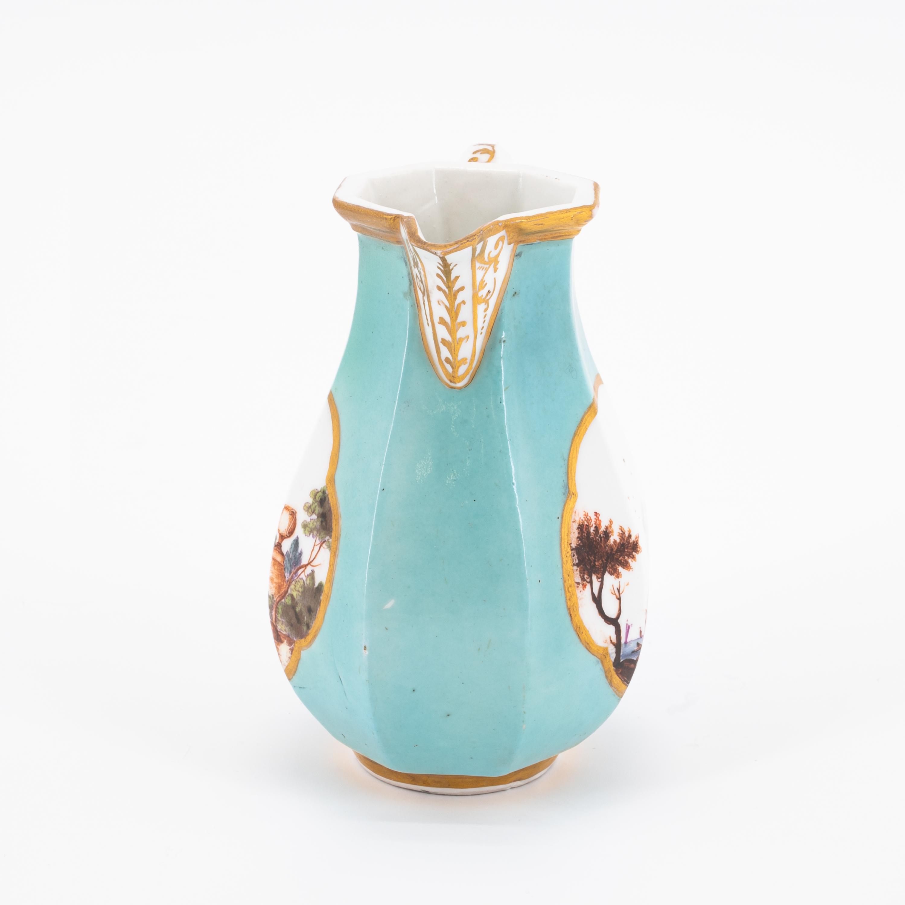 OCTAGONAL PORCELAIN CREAM JUG; HANDLES CUP AND SAUCER WITH TURQUOISE BACKGROUND AND LANDSCAPE DECORA - Image 7 of 11