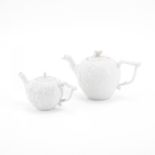 TWO PORCELAIN TEA POTS WITH LAID VINE LEAF DECOR