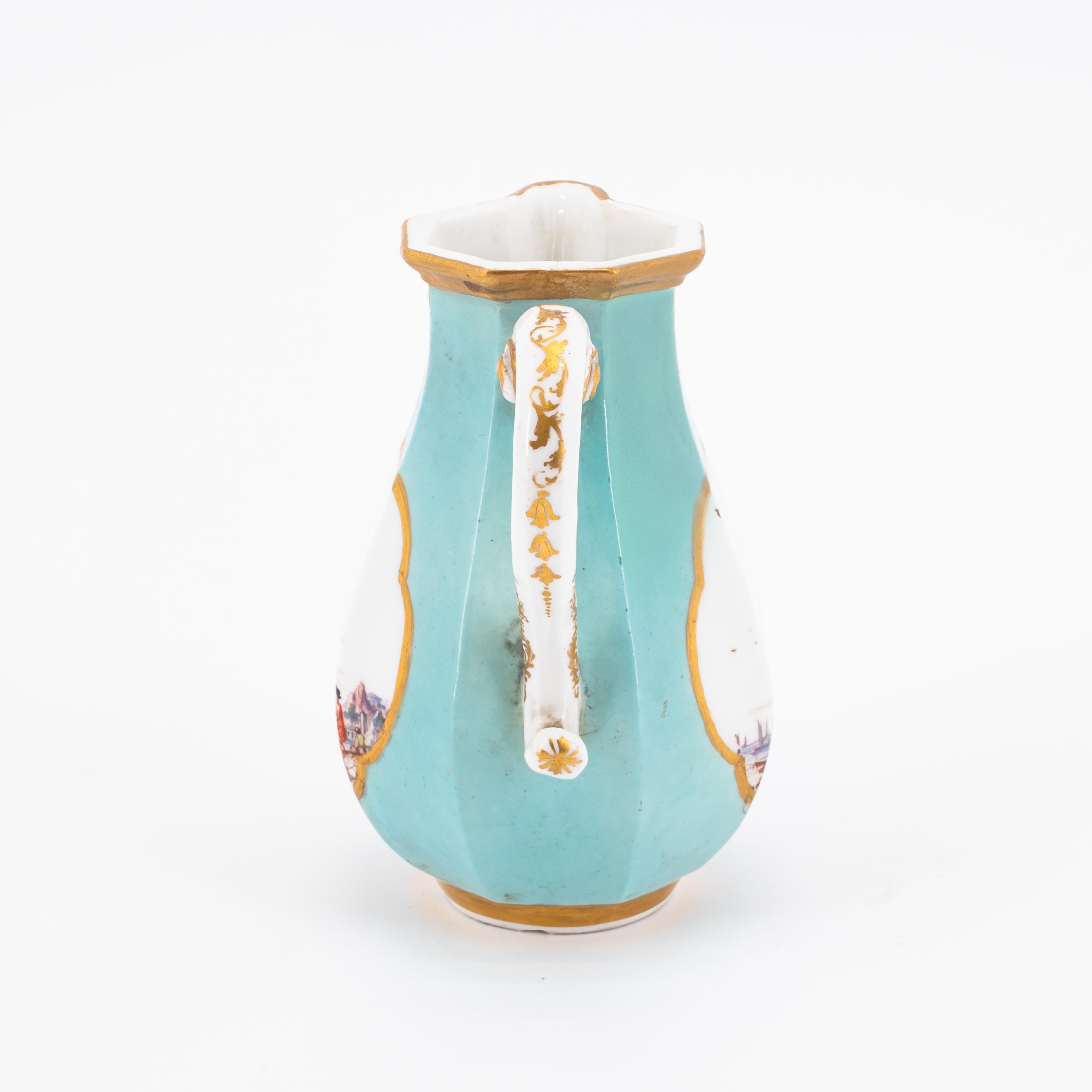 OCTAGONAL PORCELAIN CREAM JUG; HANDLES CUP AND SAUCER WITH TURQUOISE BACKGROUND AND LANDSCAPE DECORA - Image 9 of 11