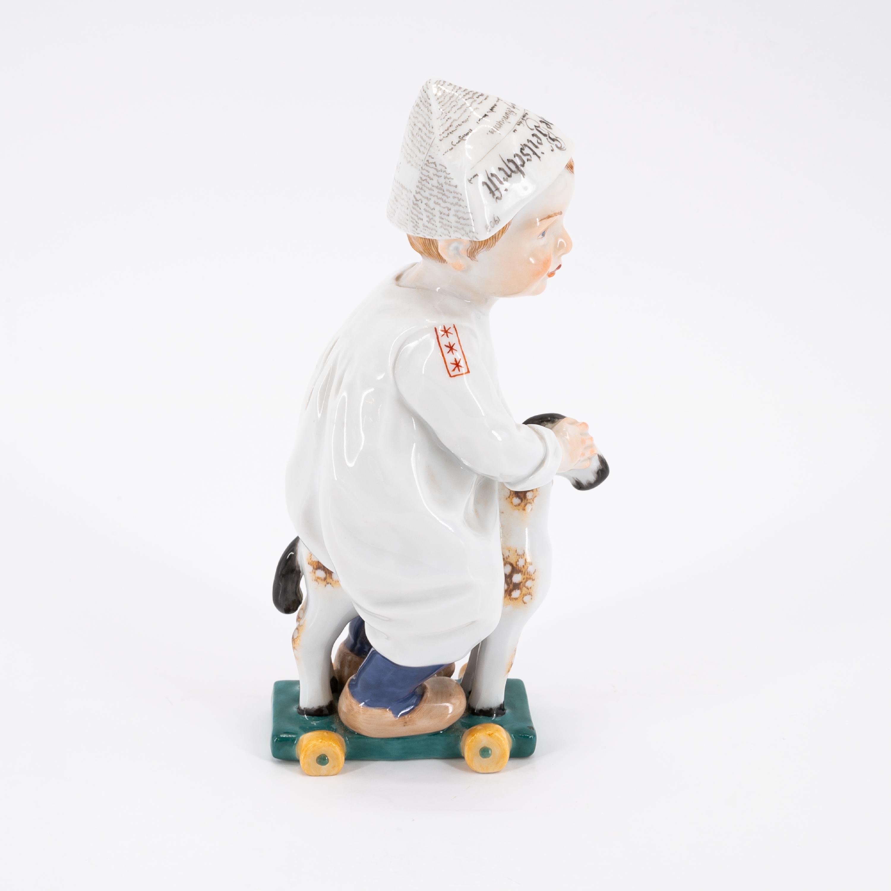 SMALL PORCELAIN BOY WITH NEWSPAPER HAT ON A LITTLE WOODEN HORSE - Image 4 of 5