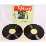 Buzzcocks - Twelve Reasons Signed LP