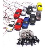 An unboxed group of HO scale plastic wired cars and lights