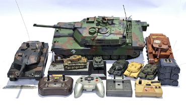 An unboxed group of mostly radio controlled military tanks