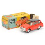 Corgi Toys 216M Austin A40  - Red body with black roof, silver trim, mechanical motor and spun hubs