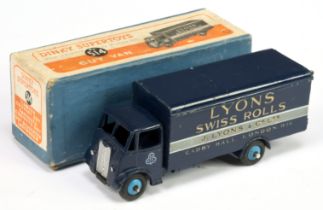 Dinky Toys 514 Guy (Type 1) "Lyons Swiss Rolls" - Dark blue body, Mid-blue rigid hubs and silver ...