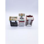 Collection of miniature jukeboxes, guitars, a saxophone and arcade machines