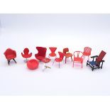 Quantity of small loose miniature designer chairs