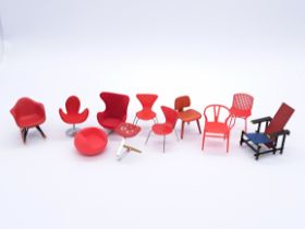 Quantity of small loose miniature designer chairs