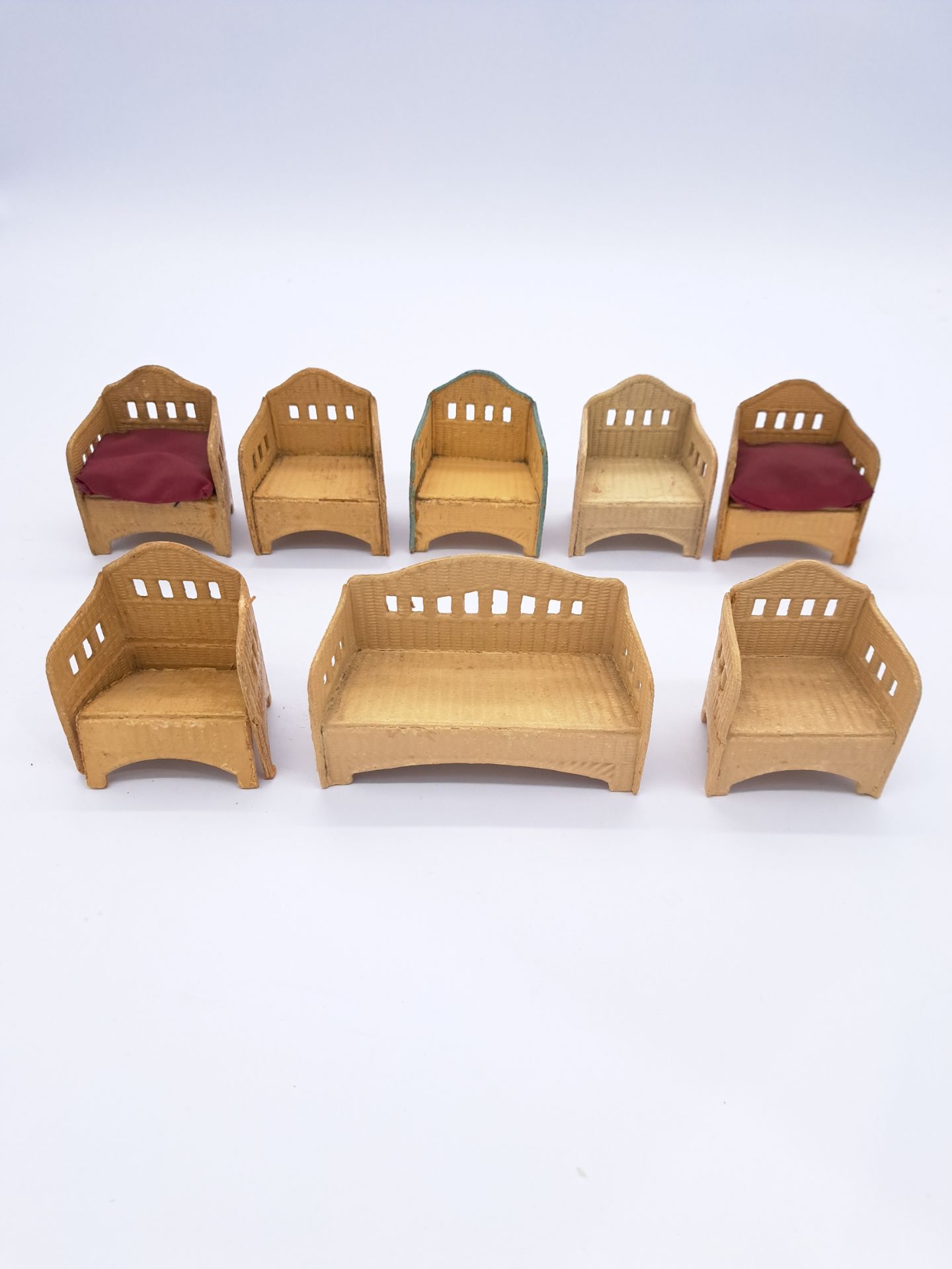 Collection of vintage rattan doll's house furniture