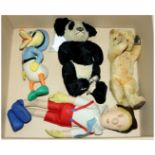 Collection of vintage teddy bears and soft toys