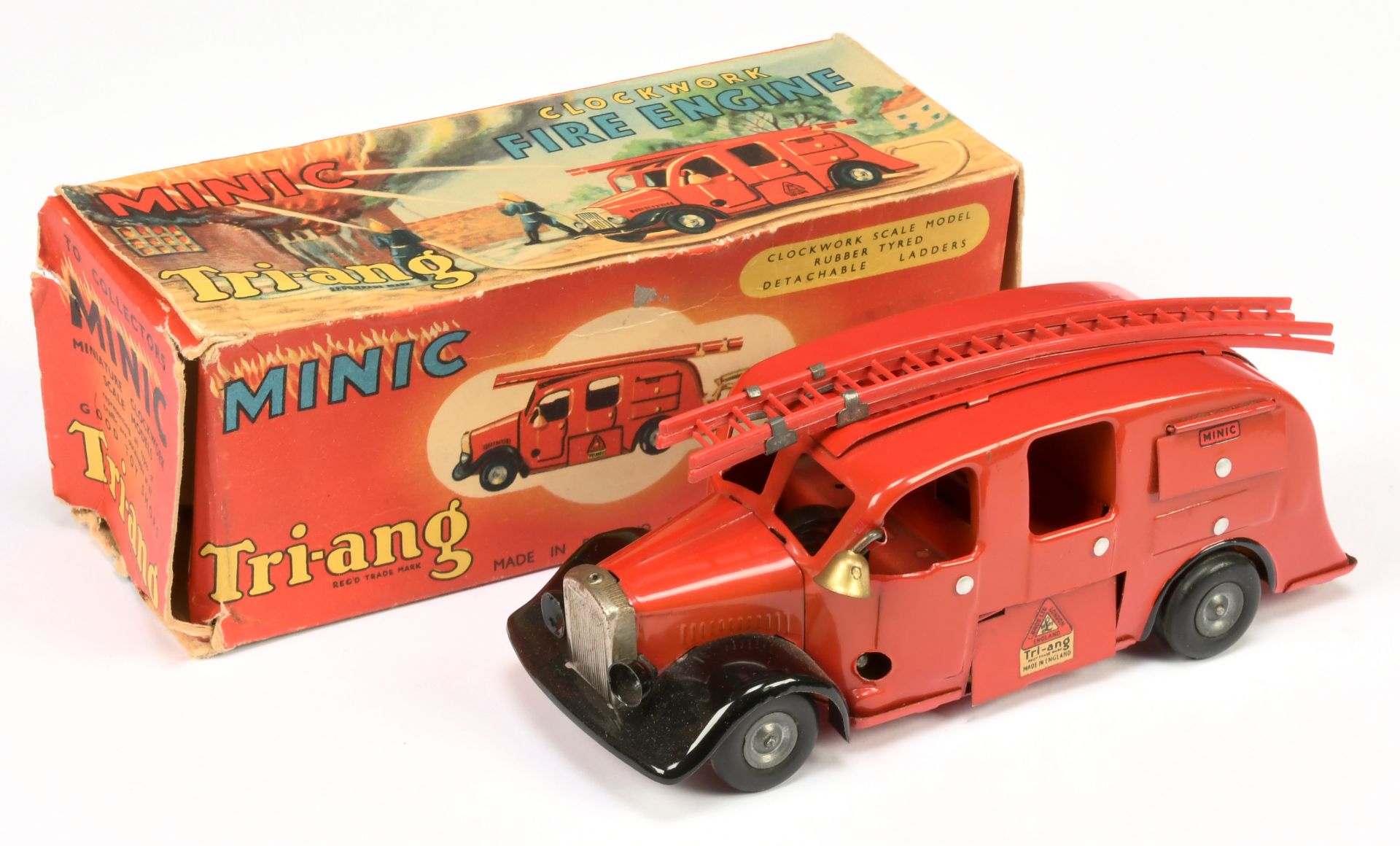 Triang Minic Clockwork 62M Fire Engine - Red including plastic ladders, black, complete with bell